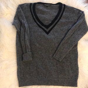 Merino wool mix striped V neck sweater.